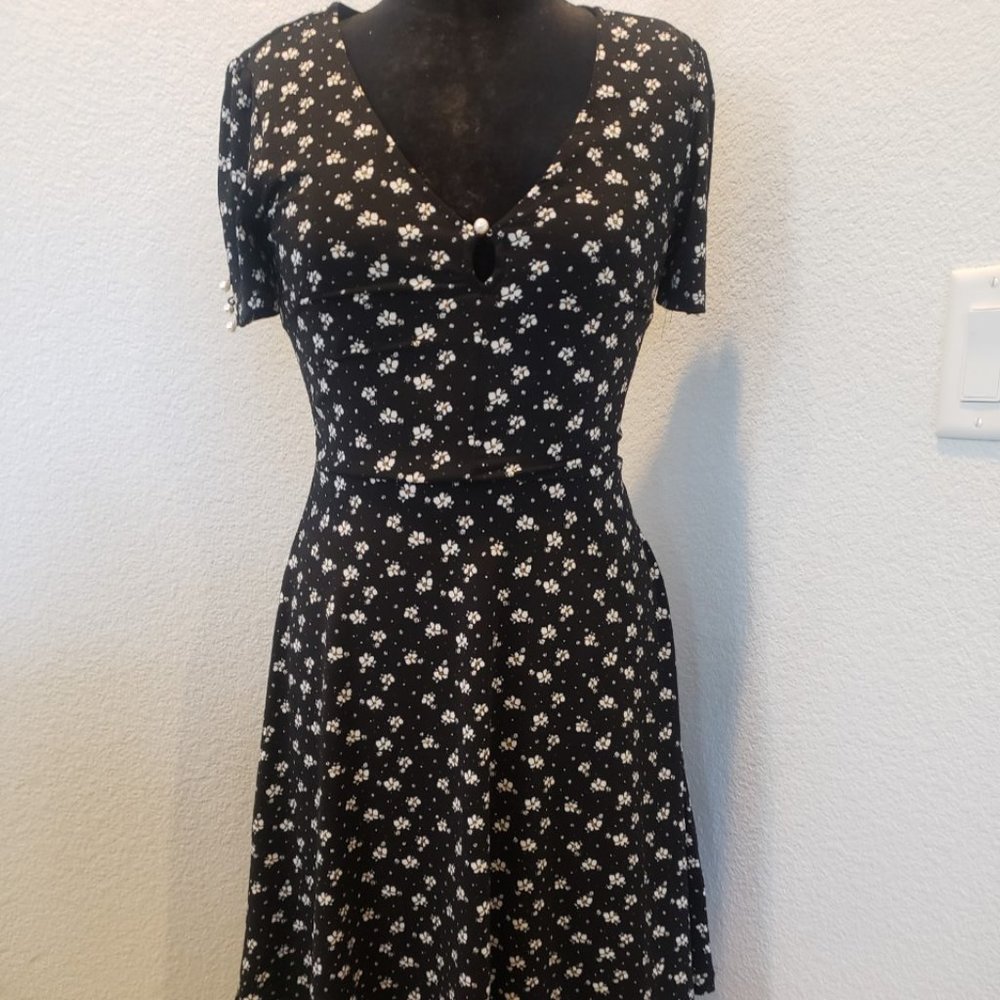 Black and white floral dress with pearl accents